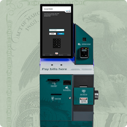 A teal bill payment kiosk with a touchscreen, keypad, and card reader, labeled "Pay bills here".
