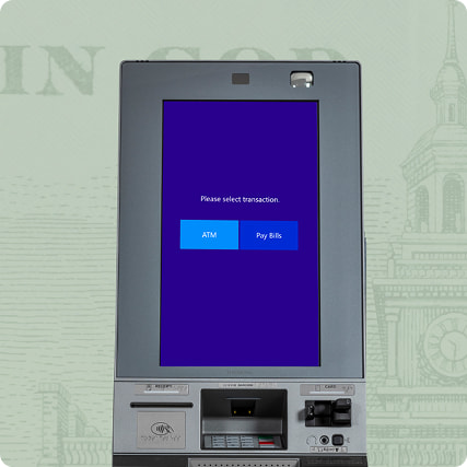ATM screen displaying two options: ATM and Pay Bills with a background of a faint building outline.